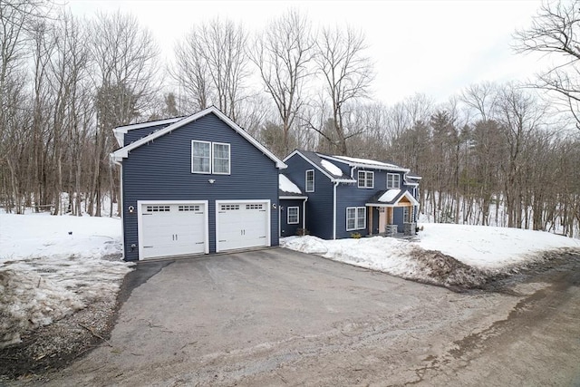 3 Woods Rd, Westminster, MA 01473 - view of front of house featuring a garage and driveway