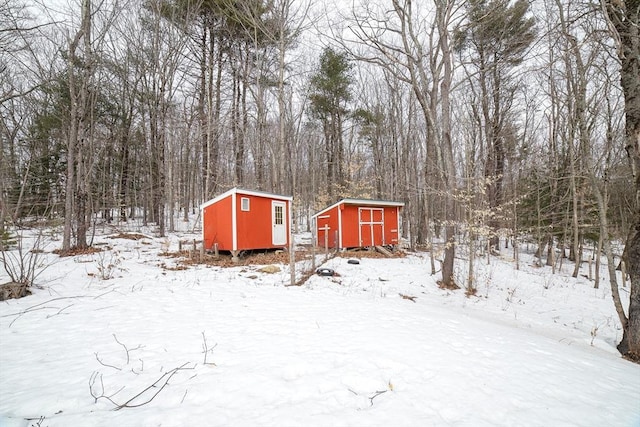 3 Woods Rd, Westminster, MA 01473 - snowy yard with an outdoor structure and a storage unit