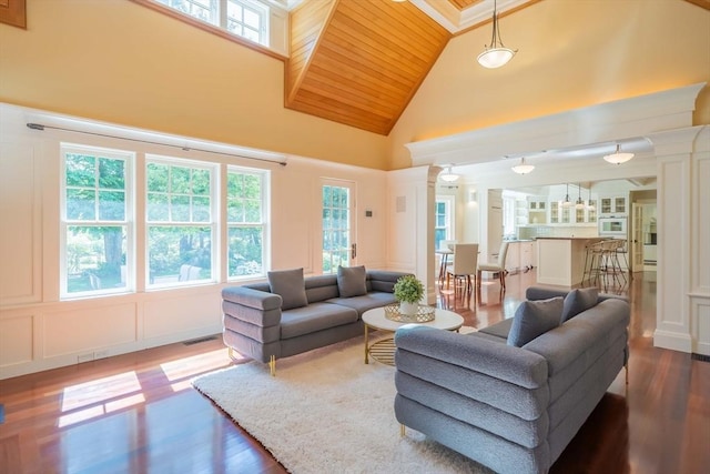 living room featuring hardwood / wood-style flooring, wooden ceiling, and high vaulted ceiling