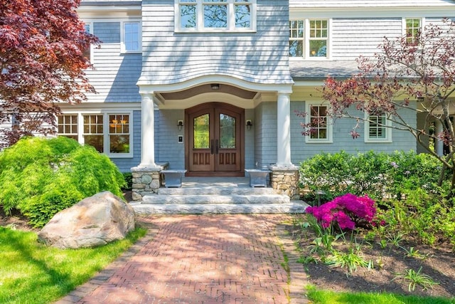 entrance to property featuring french doors