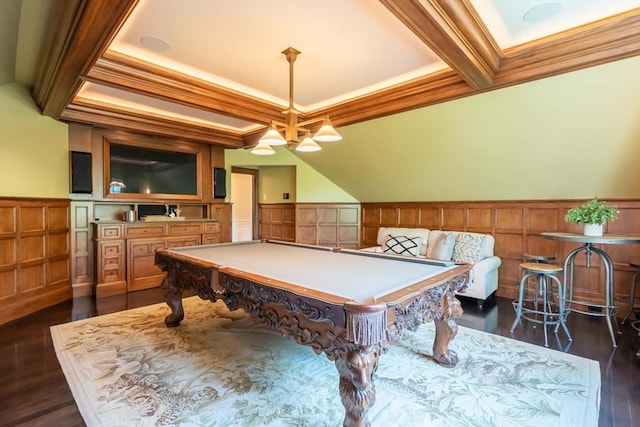 game room featuring dark wood-type flooring, billiards, coffered ceiling, ornamental molding, and beamed ceiling