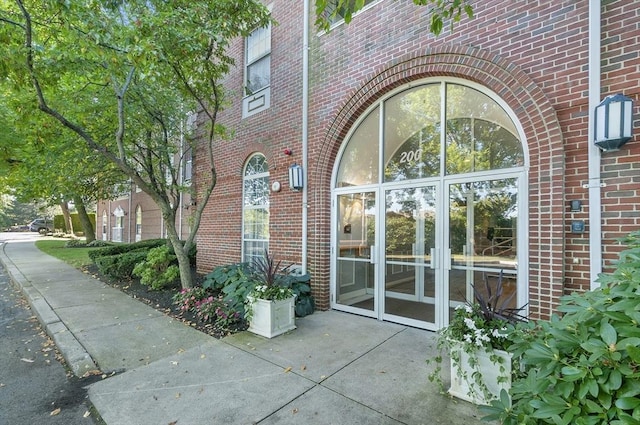 property entrance featuring french doors