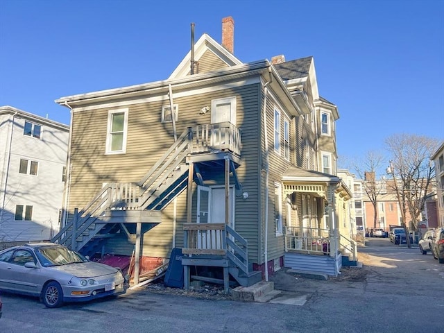 view of front of home with a chimney