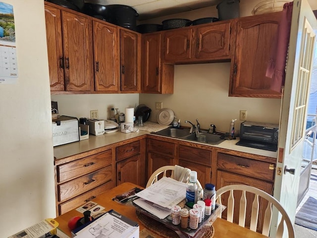889 Amesbury Rd, Haverhill, MA 01830 - kitchen with light countertops and brown cabinets