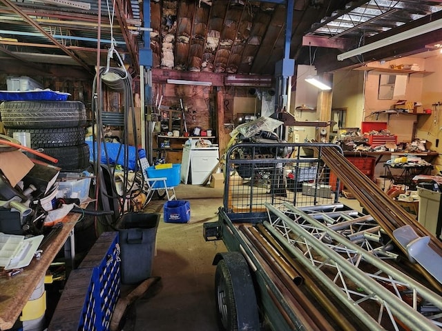 889 Amesbury Rd, Haverhill, MA 01830 - miscellaneous room featuring a workshop area and concrete floors
