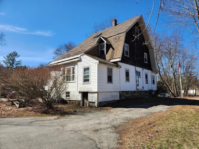 889 Amesbury Rd, Haverhill, MA 01830 - view of property exterior with a chimney and a gambrel roof