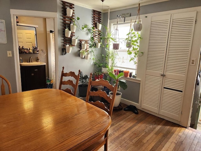 889 Amesbury Rd, Haverhill, MA 01830 - dining space featuring wood-type flooring and baseboards