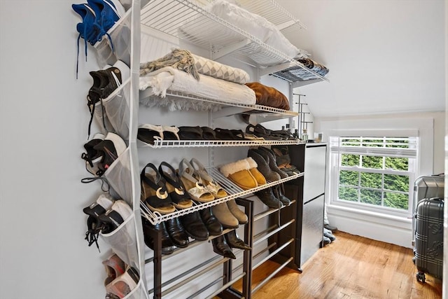 10 Carlisle Rd Unit 10, Bedford, MA 01730 - walk in closet featuring wood finished floors