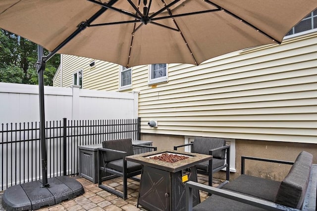 10 Carlisle Rd Unit 10, Bedford, MA 01730 - view of patio / terrace with an outdoor fire pit