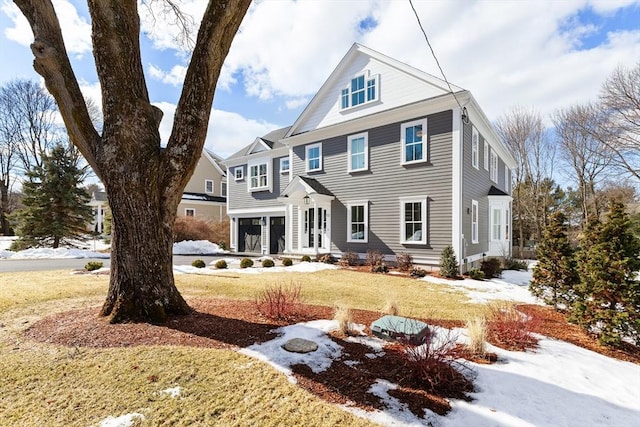 view of front of home featuring a lawn