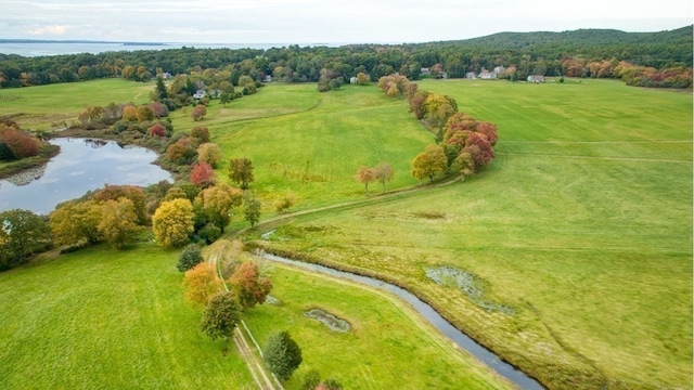 aerial view featuring a rural view and a water view