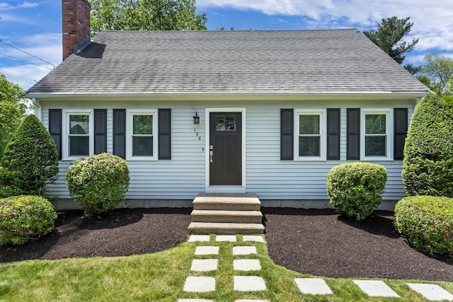 194 Crossfield Rd, Franklin, MA 02038 - view of front of property with a chimney and a shingled roof