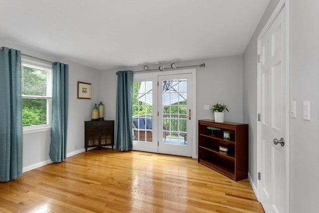 194 Crossfield Rd, Franklin, MA 02038 - doorway to outside featuring healthy amount of natural light and light wood finished floors