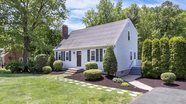 194 Crossfield Rd, Franklin, MA 02038 - new england style home featuring a front lawn and a chimney