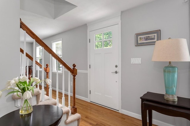 194 Crossfield Rd, Franklin, MA 02038 - entryway with stairway and light wood-style flooring