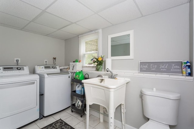 194 Crossfield Rd, Franklin, MA 02038 - laundry area with separate washer and dryer and light tile patterned floors