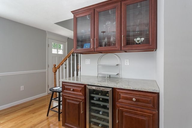 194 Crossfield Rd, Franklin, MA 02038 - bar area with beverage cooler, light wood-type flooring, and stairs