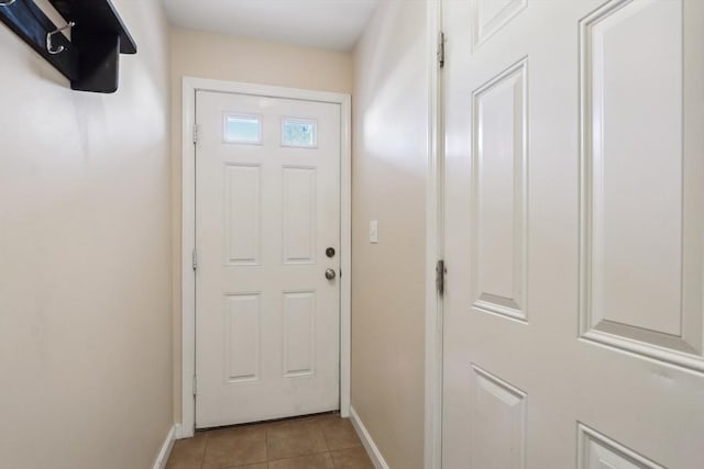 doorway featuring light tile patterned floors