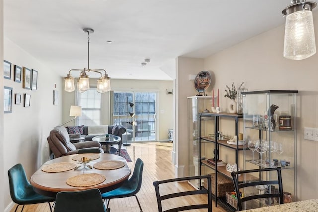 dining area with light wood-type flooring