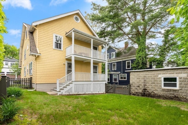 17-19 Newtonville Ave Unit 2, Newton, MA 02458 - back of house with a balcony and covered porch