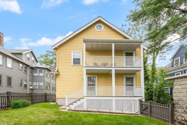 17-19 Newtonville Ave Unit 2, Newton, MA 02458 - rear view of property featuring a balcony, covered porch, and stairway