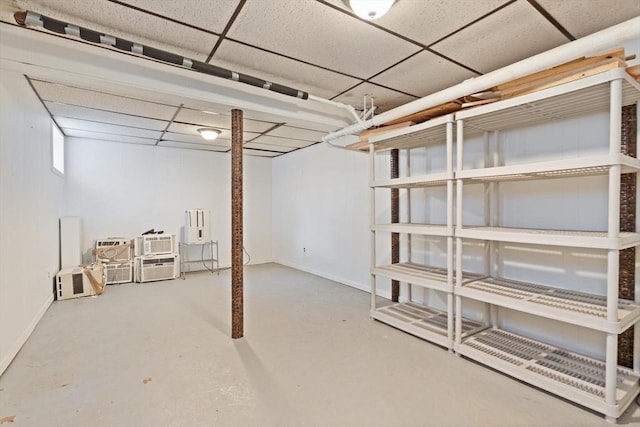 17-19 Newtonville Ave Unit 2, Newton, MA 02458 - finished below grade area with baseboards and a paneled ceiling