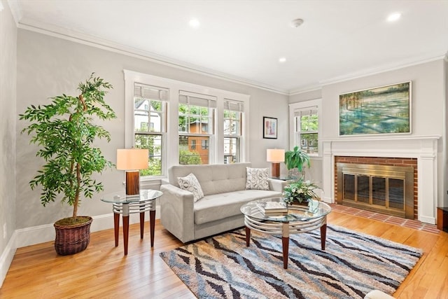 17-19 Newtonville Ave Unit 2, Newton, MA 02458 - living room with plenty of natural light, ornamental molding, hardwood / wood-style floors, a brick fireplace, and recessed lighting