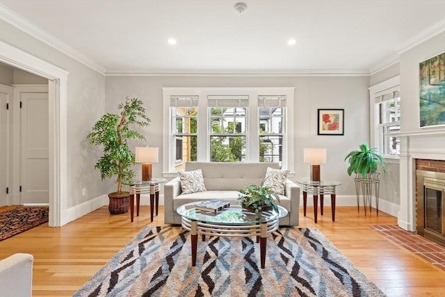17-19 Newtonville Ave Unit 2, Newton, MA 02458 - living area with light wood-style flooring, a brick fireplace, baseboards, crown molding, and recessed lighting