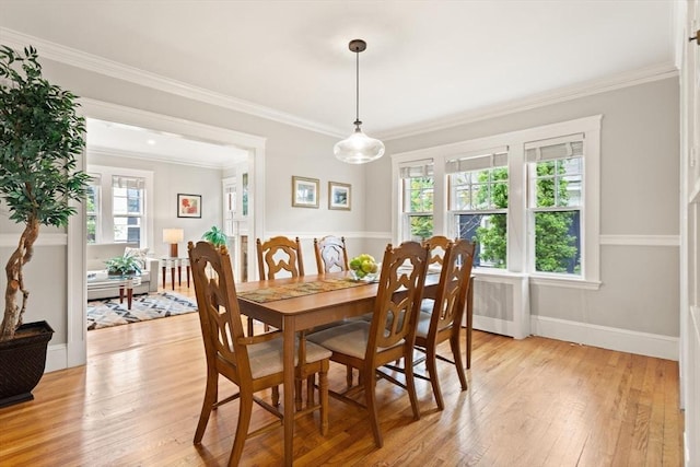 17-19 Newtonville Ave Unit 2, Newton, MA 02458 - dining space with light wood-style floors, crown molding, and baseboards