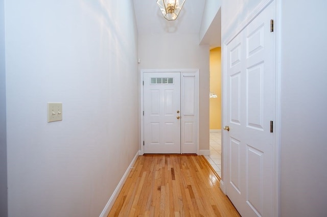 hall with light wood-type flooring