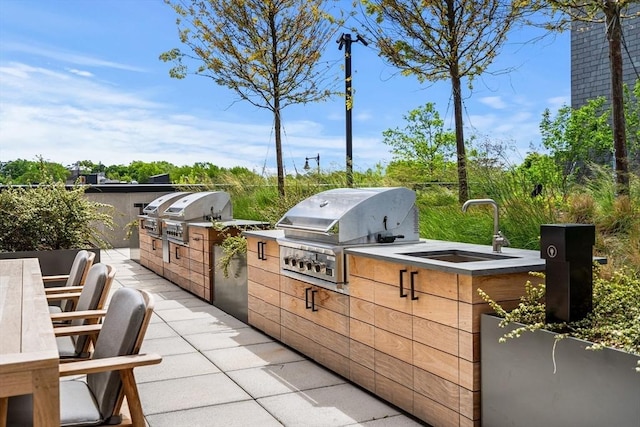 1515 Commonwealth Ave Unit 211, Boston, MA 02135 - view of patio / terrace with a sink