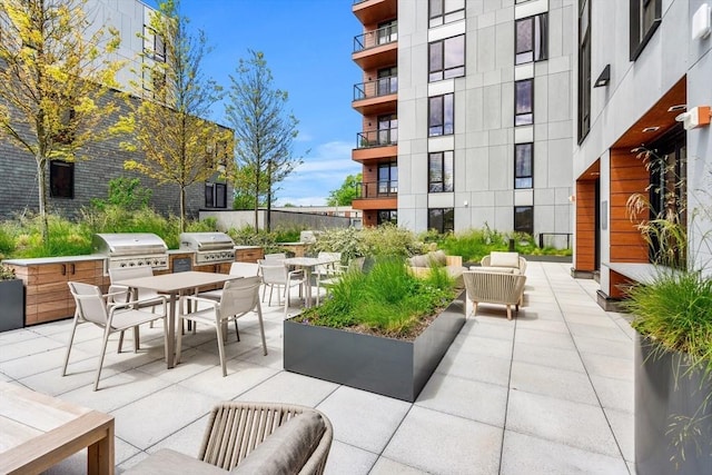 1515 Commonwealth Ave Unit 211, Boston, MA 02135 - view of patio with outdoor dining space and outdoor lounge area