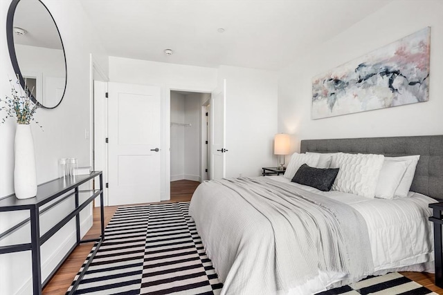1515 Commonwealth Ave Unit 211, Boston, MA 02135 - bedroom with wood finished floors