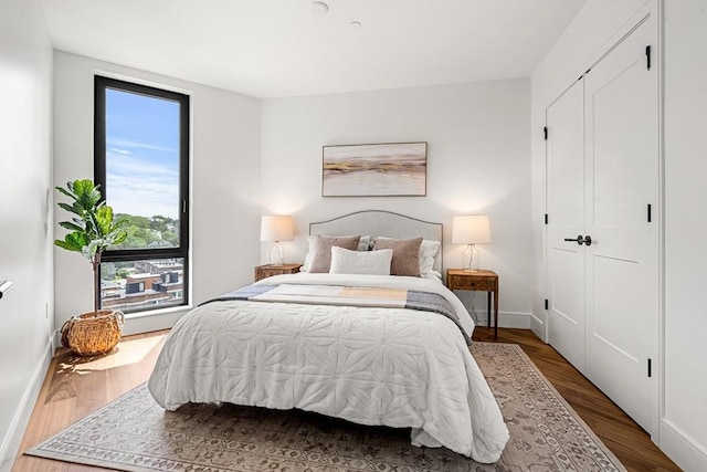 1515 Commonwealth Ave Unit 211, Boston, MA 02135 - bedroom featuring wood finished floors and baseboards