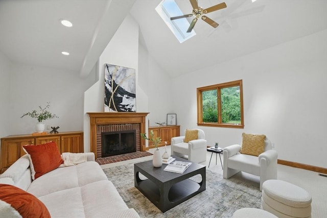 9 Buffalo Run, Southborough, MA 01772 - living area with high vaulted ceiling, ceiling fan, a skylight, and a fireplace
