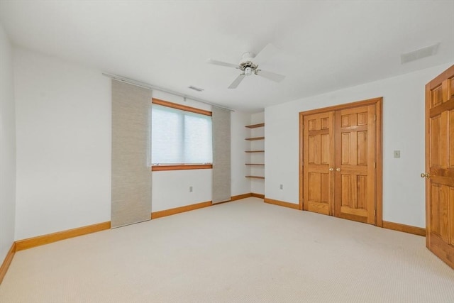 9 Buffalo Run, Southborough, MA 01772 - unfurnished bedroom featuring light colored carpet, a ceiling fan, and a closet