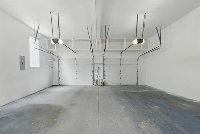 9 Buffalo Run, Southborough, MA 01772 - garage with a garage door opener and electric panel