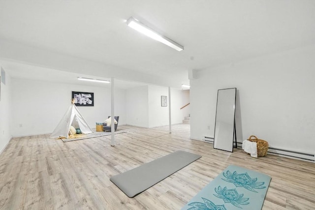 9 Buffalo Run, Southborough, MA 01772 - exercise room featuring wood finished floors and baseboard heating