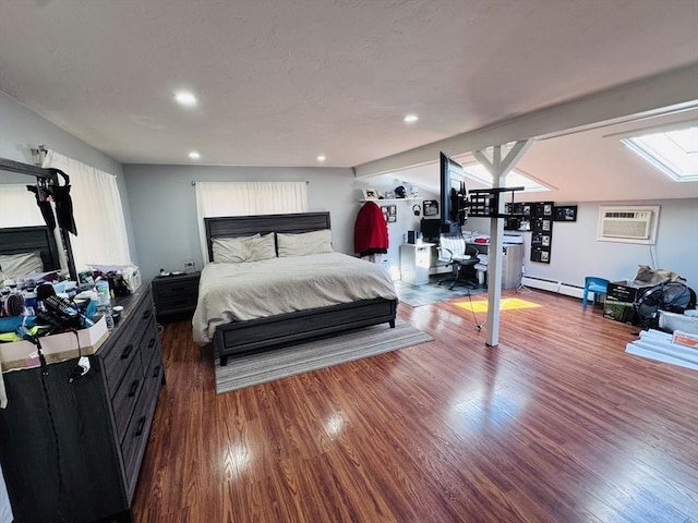 bedroom with recessed lighting, an AC wall unit, a baseboard heating unit, and dark wood-style flooring