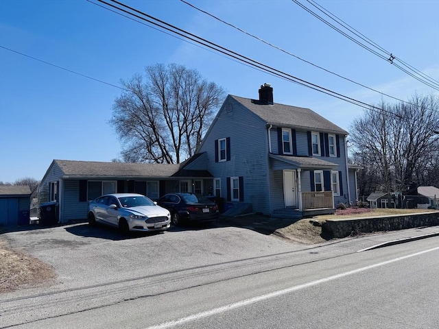 view of front of property featuring a chimney