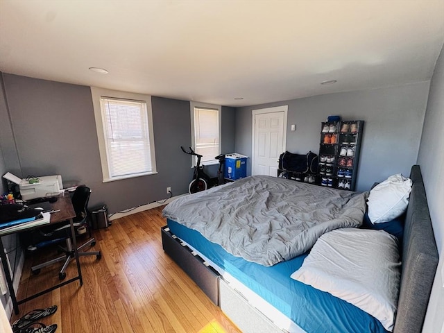 bedroom featuring light wood-type flooring