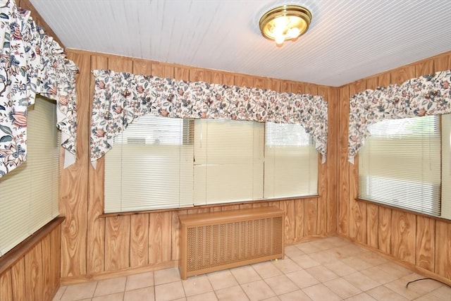 81 Osborne Ter, Springfield, MA 01104 - unfurnished sunroom featuring radiator heating unit