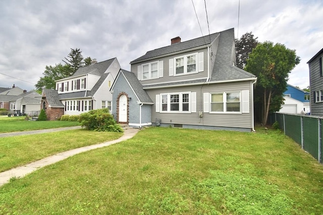 81 Osborne Ter, Springfield, MA 01104 - view of front of property featuring a chimney and a shingled roof