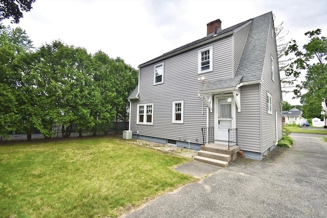 81 Osborne Ter, Springfield, MA 01104 - back of house featuring a chimney and a shingled roof