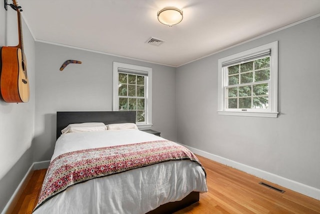 103 Randlett Park, Newton, MA 02465 - bedroom featuring crown molding and wood finished floors