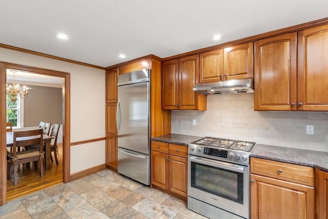 103 Randlett Park, Newton, MA 02465 - kitchen featuring stainless steel appliances, under cabinet range hood, a chandelier, tasteful backsplash, and recessed lighting