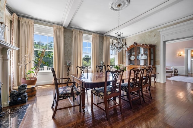 dining area with an inviting chandelier, hardwood / wood-style flooring, and a wealth of natural light