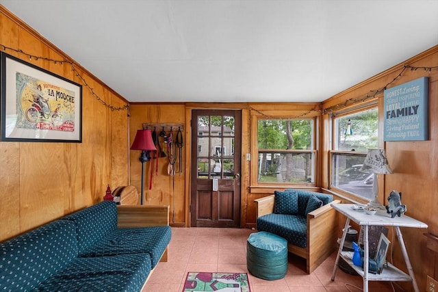 64 Bayside Dr, Falmouth, MA 02540 - living area featuring wood walls and light tile patterned floors