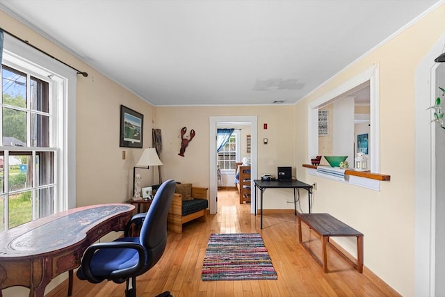64 Bayside Dr, Falmouth, MA 02540 - home office featuring light wood-type flooring, baseboards, and crown molding