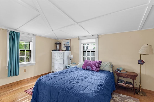 64 Bayside Dr, Falmouth, MA 02540 - bedroom with wood finished floors, baseboards, and coffered ceiling